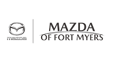 Mazda dealership logo with stylish text and emblem.